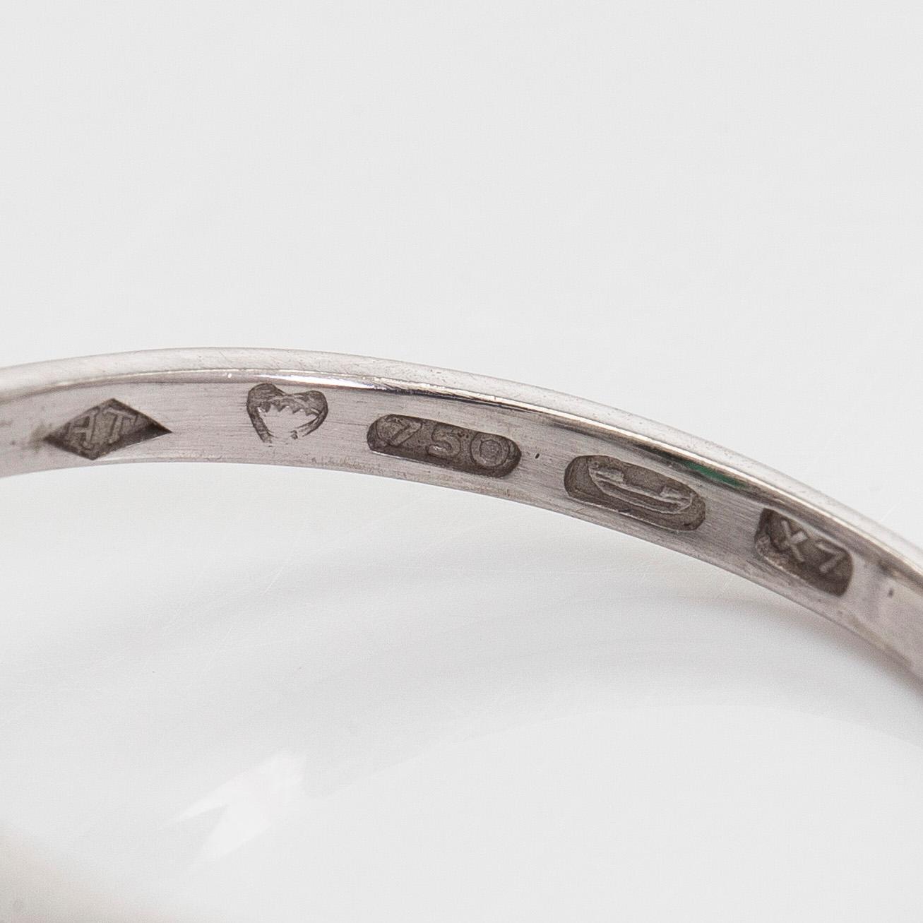 RING, fasettslipad turmalin, åttkantslipade diamanter, 18K vitguld. A. Tillander, Helsingfors 1975.