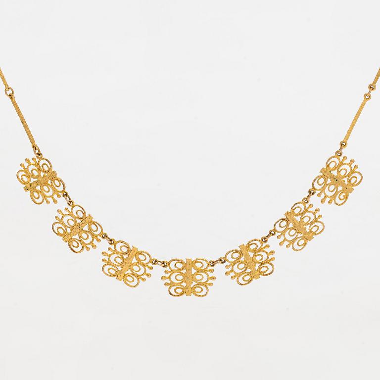 Esko Raitanen, collier, armband och örhängen, 14K guld, Helsingfors 1972.
