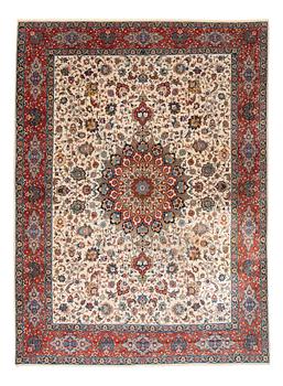 A carpet, semi-antique Tabriz, ca 379 x 280 cm.