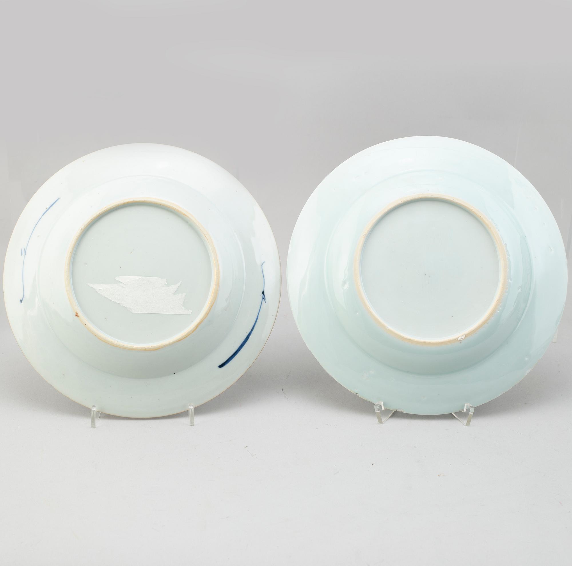 Four blue and white export porcelain plates, three soup plates and a serving dish, Qing dynasty, Qianlong (1736-95).