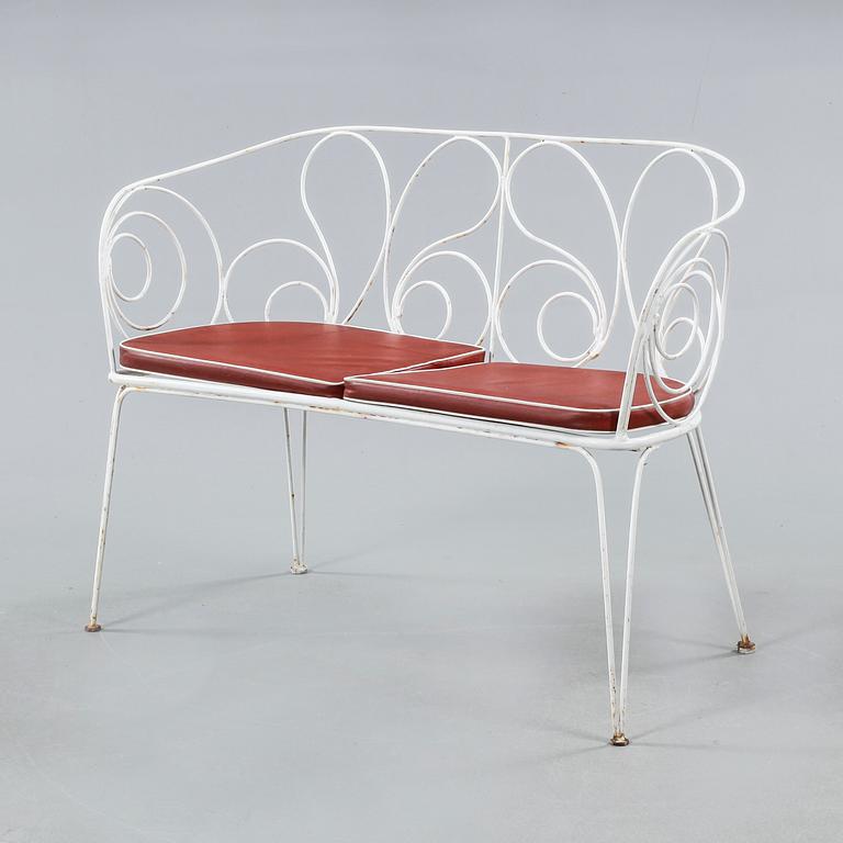 Four 20th century garden furnitures.