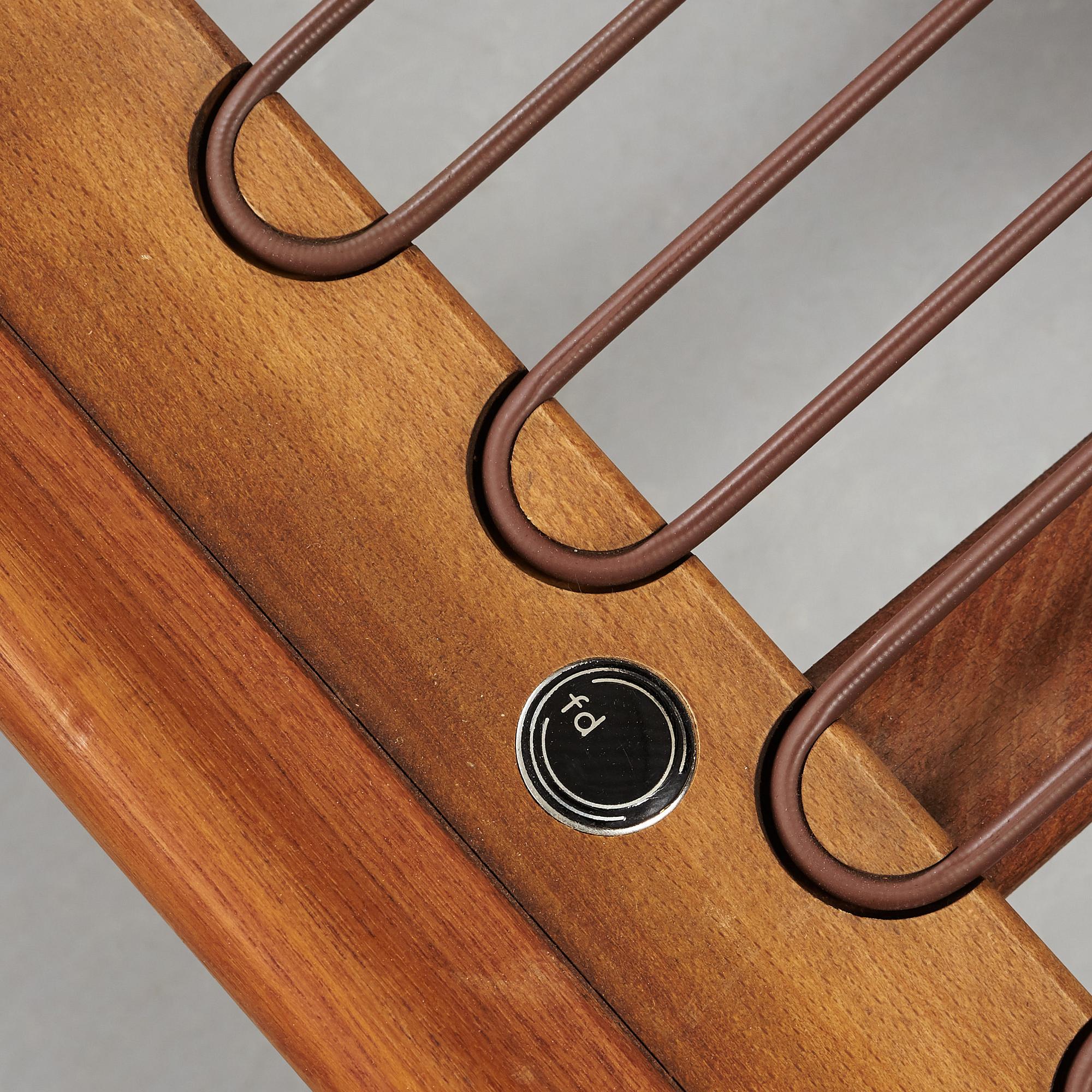 A set of two Danish 'Minerva' sofas with a table for France & Daverkosen.