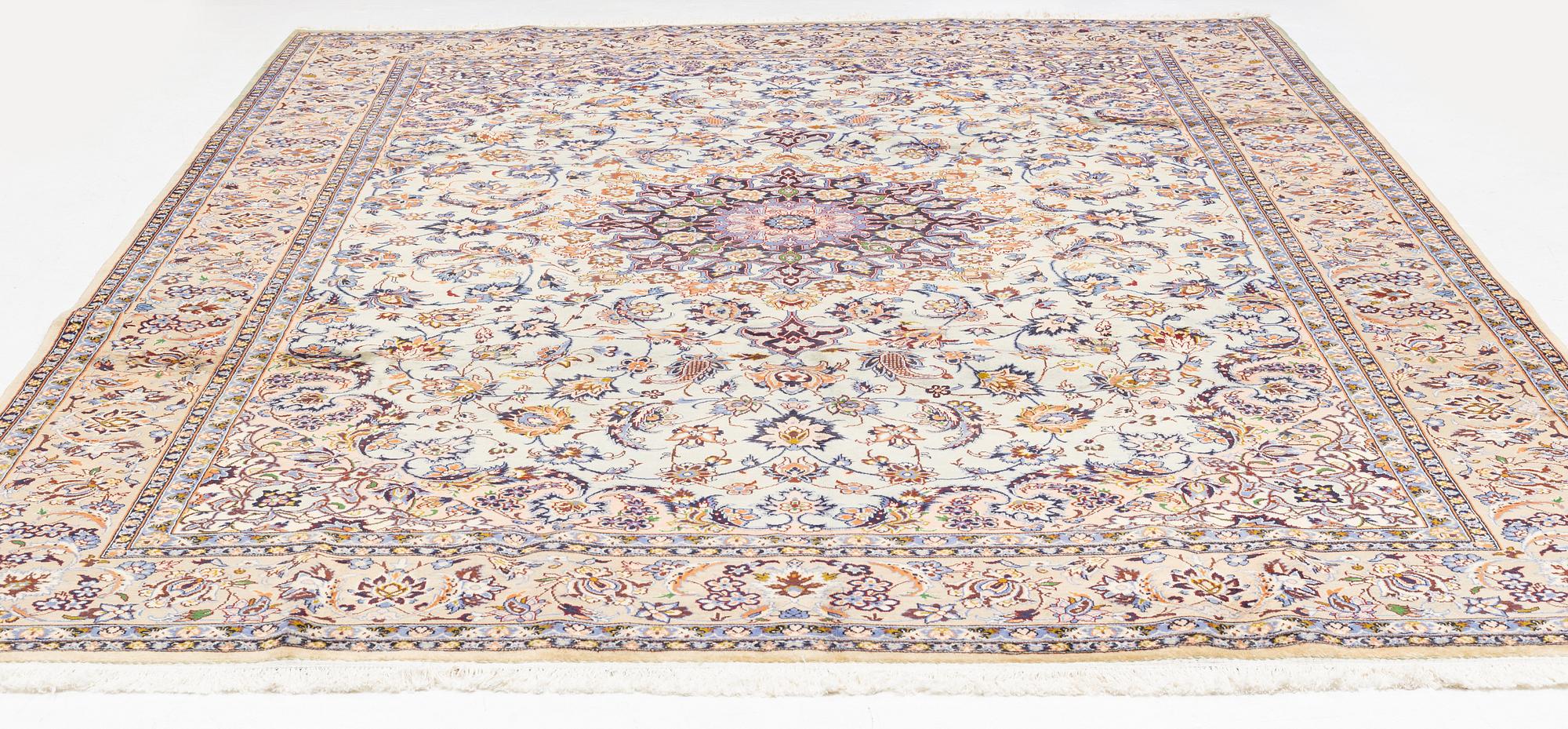 A Keshan carpet, c. 393 x 290 cm.