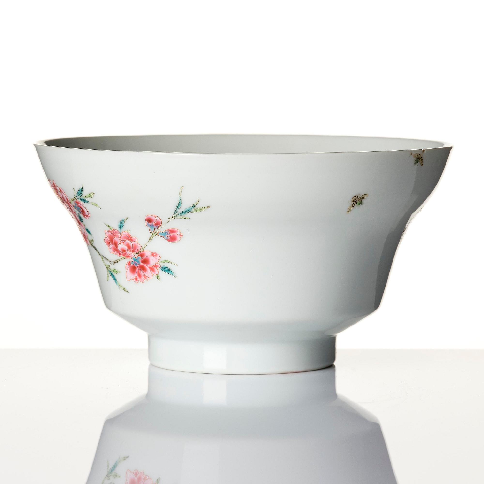 A fine famille rose ''prunus and magnolia' bowl, Qing dynasty.