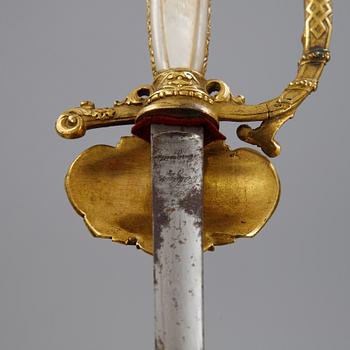A french small sword with scabbard, early 19th Century.