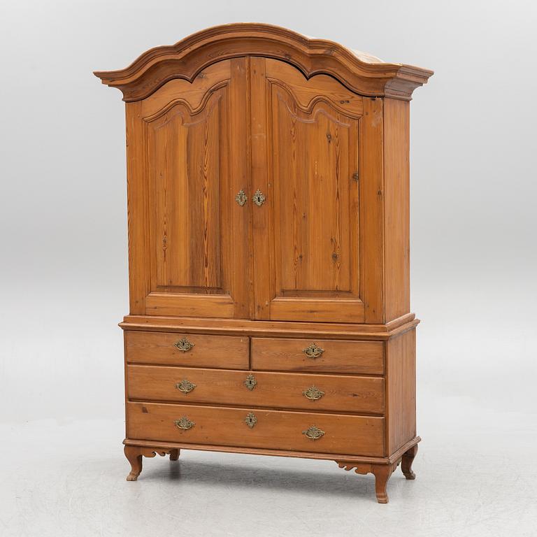 An 18th two-part pine century cabinet.