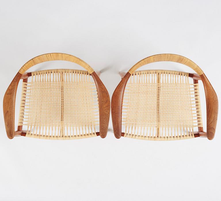 Hans J. Wegner, a pair of teak and rattan 'The Chair', JH-503, Johannes Hansen, Denmark 1950s.