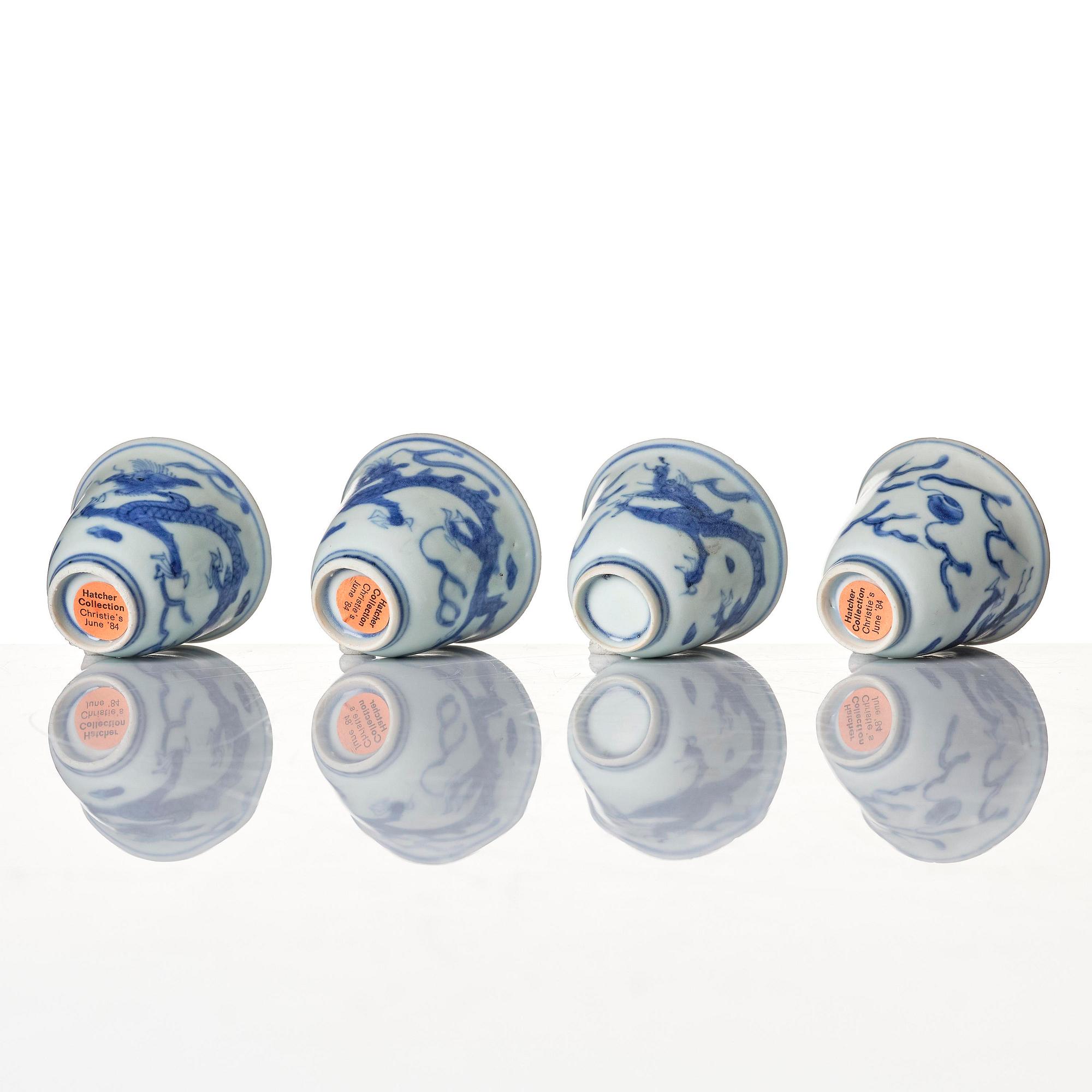 A set of four blue and white dragon wine cups, 'Hatcher Cargo', 17th century.