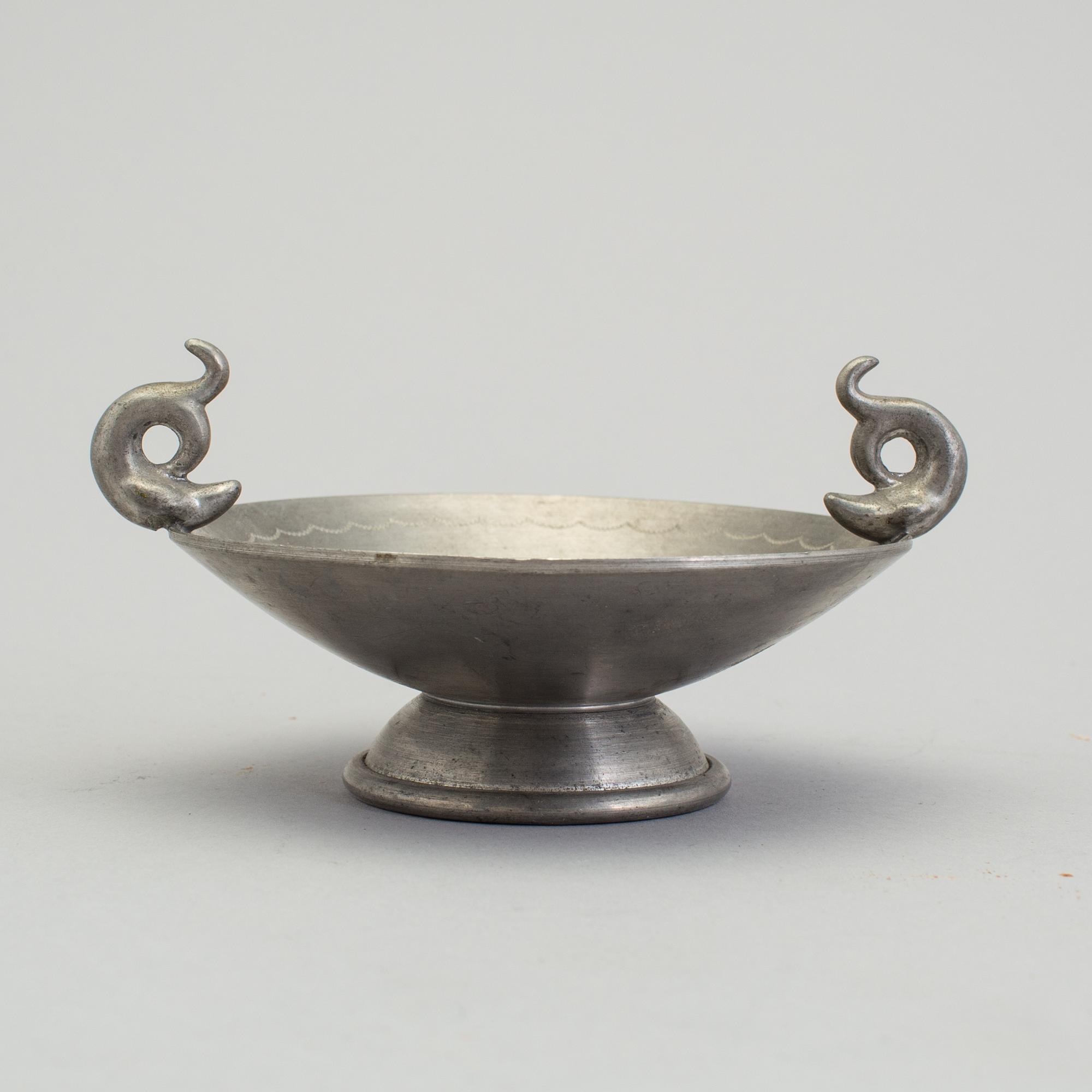 Five coasters, a vase, a bowl,  and an ashtray by Firma Svenskt Tenn first half of 20th centuty.