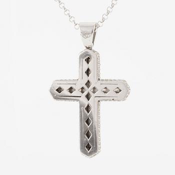 Necklace, 18K white gold in the form of a cross, set with baguette and brilliant-cut diamonds.