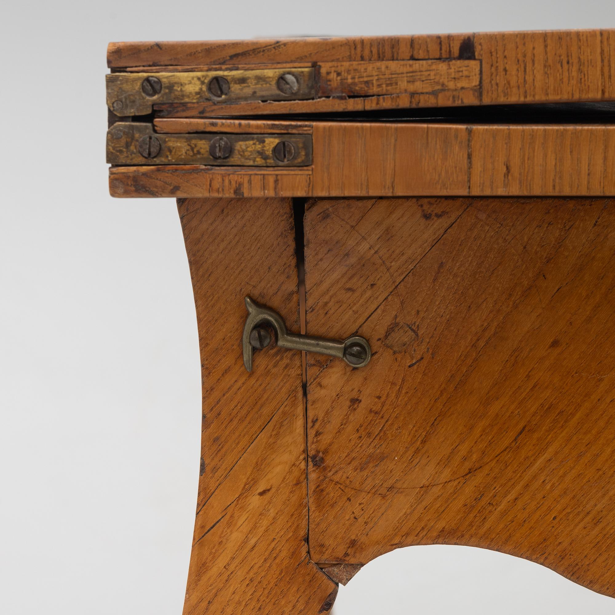 A rococo card table, mid 18th century.