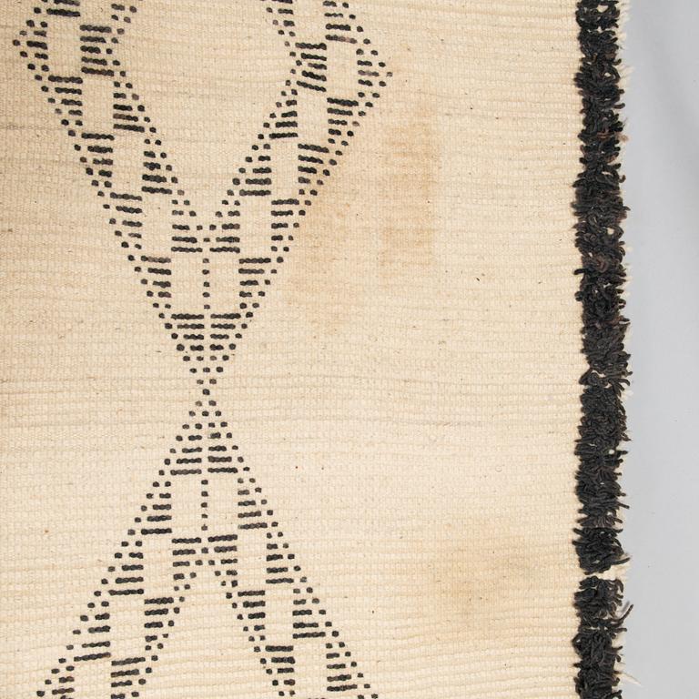 A Moroccan Beni Ourain carpet. circa 420x196 cm.
