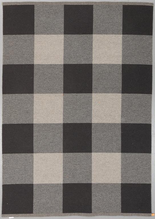 A mashine woven carpet, "Checkerboard", designed by Gunilla Lagerhem-Ullberg, Kasthall, around 246 x 163 cm.