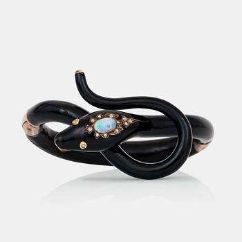 467. A Victorian snake bracelet in black enamel set with an opal and rose-cut diamonds.