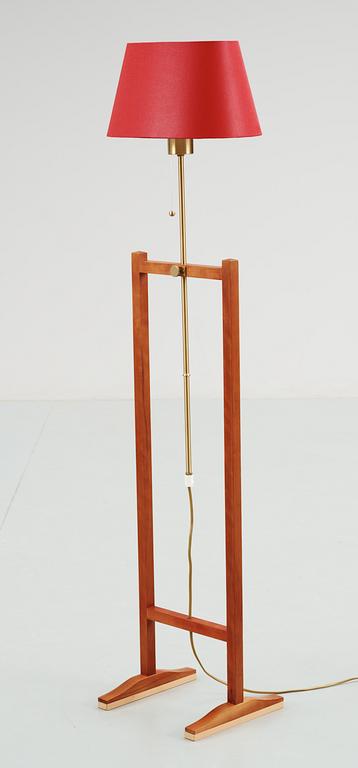A Josef Frank mahogany and brass floor lamp, Svenskt Tenn, model 2548.