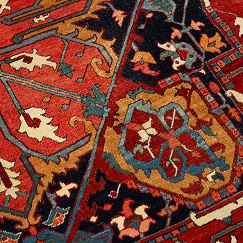 An antique Heriz Serapi carpet, north west persia, c 400-405 x 337 cm.