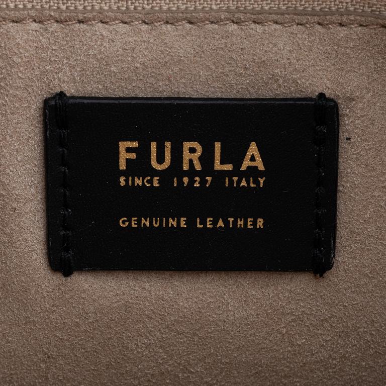 Furla, a red leather handbag.