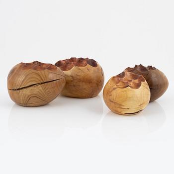 Magnus Ek, a set of four wooden appetize holders for Oaxen Krog.