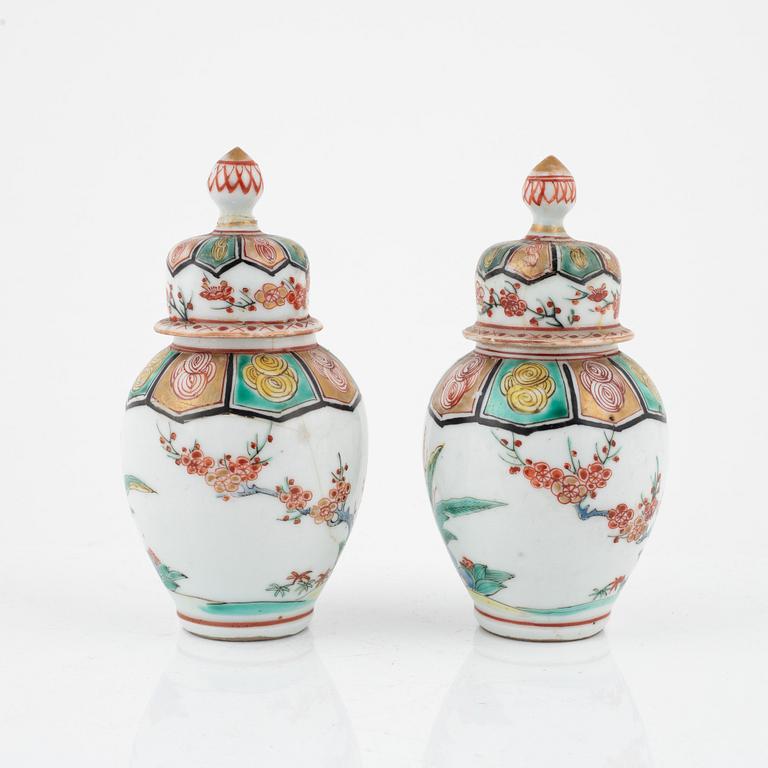 A pair of Japanese jars with covers, circa 1900.