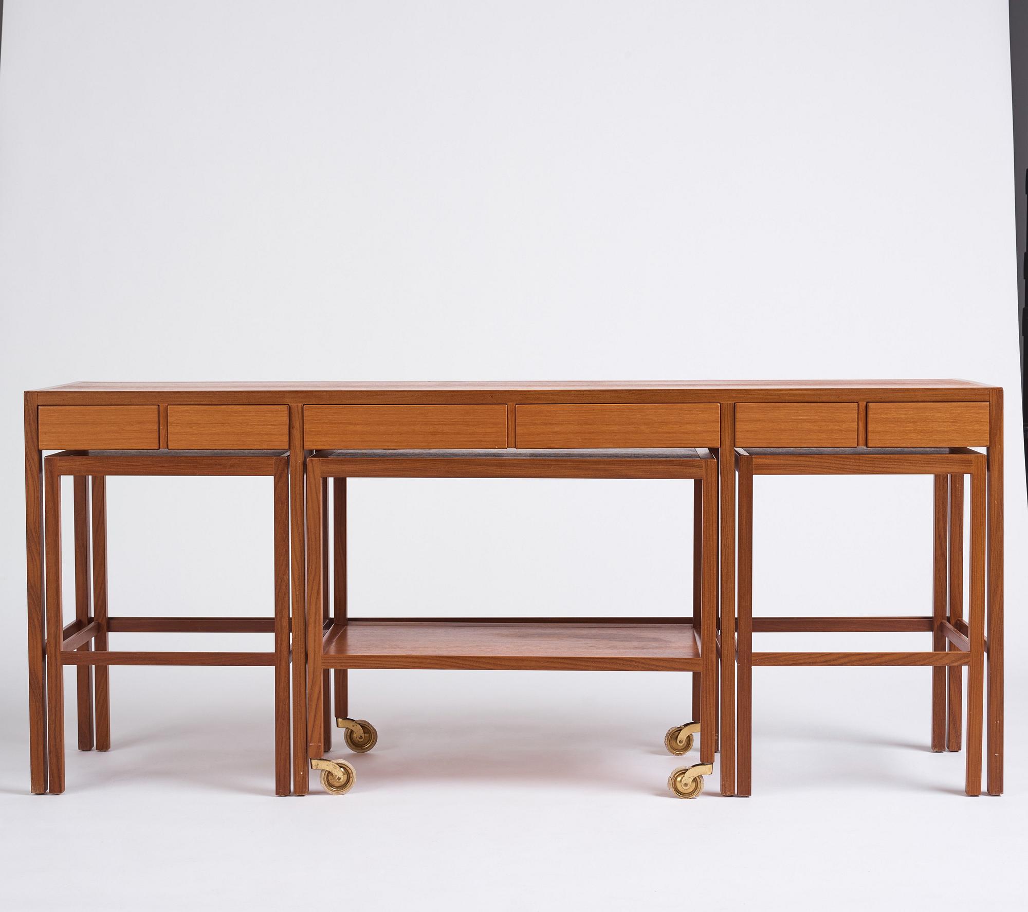 Nordiska Kompaniet, a sideboard with tables and a serving trolley, Sweden 1950s.