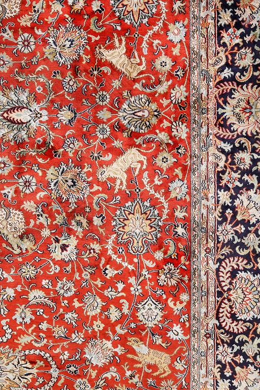 A pictoral orientalisk silk carpet, ca 284 x 180 cm.