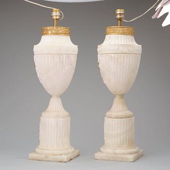 A pair of 19th century alabaster urns.