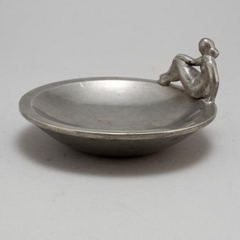 a pewter plate by Firma Svenskt Tenn Stockholm, 1928.