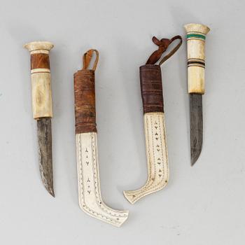 ERIK TUOLJA, two Sami reindeer horn knives, signed ET.