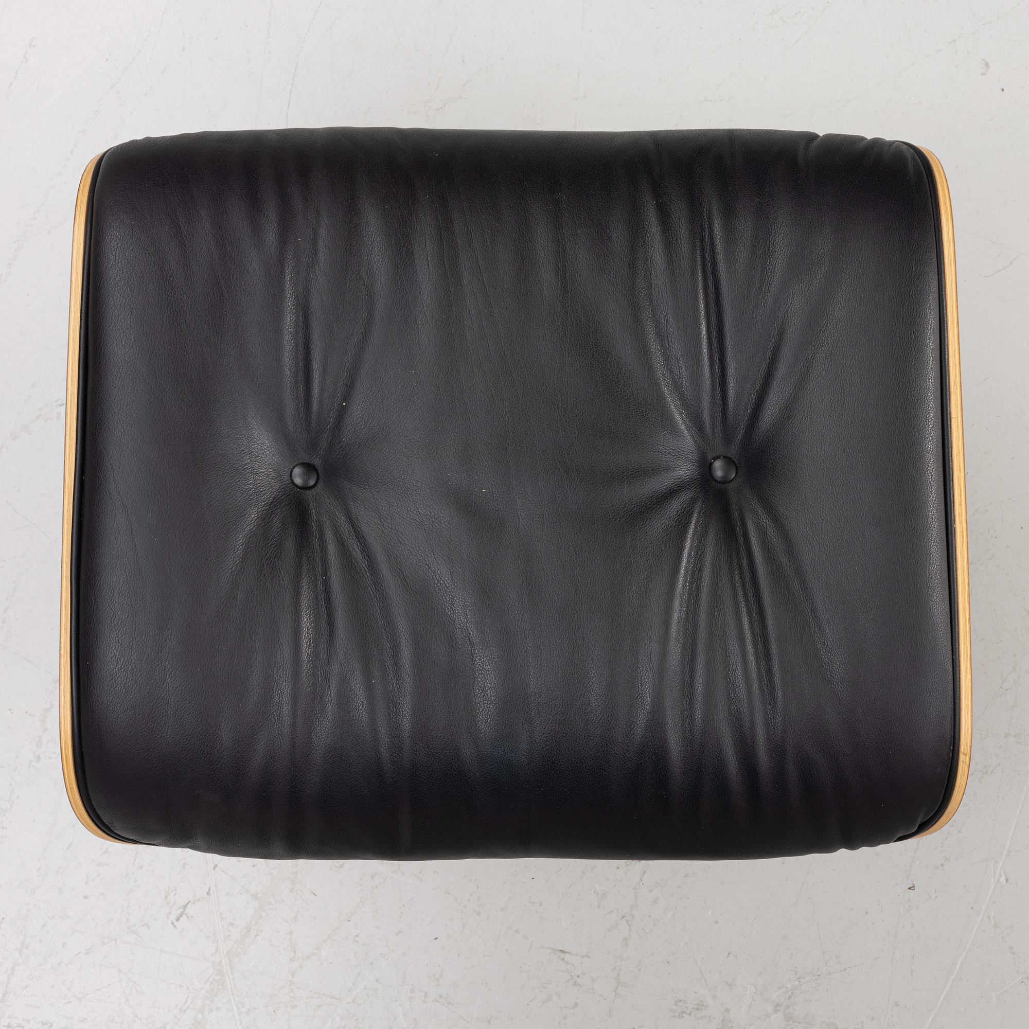 Charles & Ray Eames, Armchair with ottoman, "Lounge chair", Vitra, 21st century.