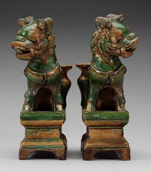 A pair of seated Buddhist lions, 17th Century.