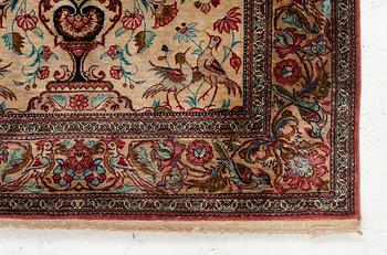 A Qum silk rug, c. 110 x 76 cm.