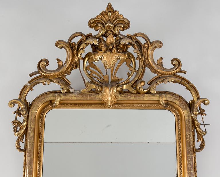 An early 20th century Rococo style mirror.