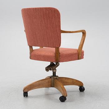 A Swedish Modern mid 20th century office chair.