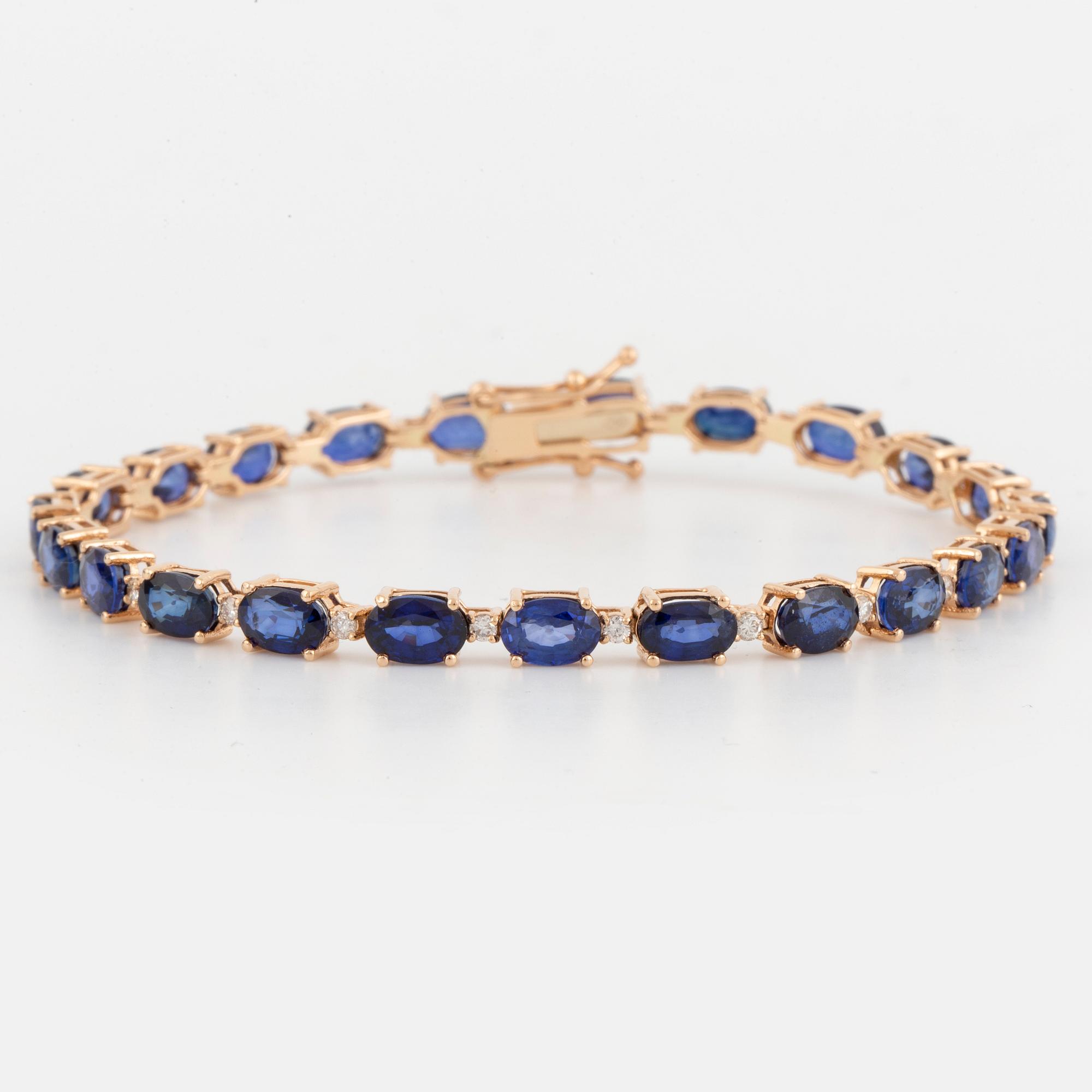 ARMBAND, med safirer och briljantslipade diamanter.