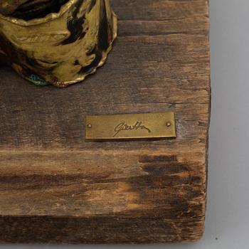 A signed sculpture by Claes E. Giertta.