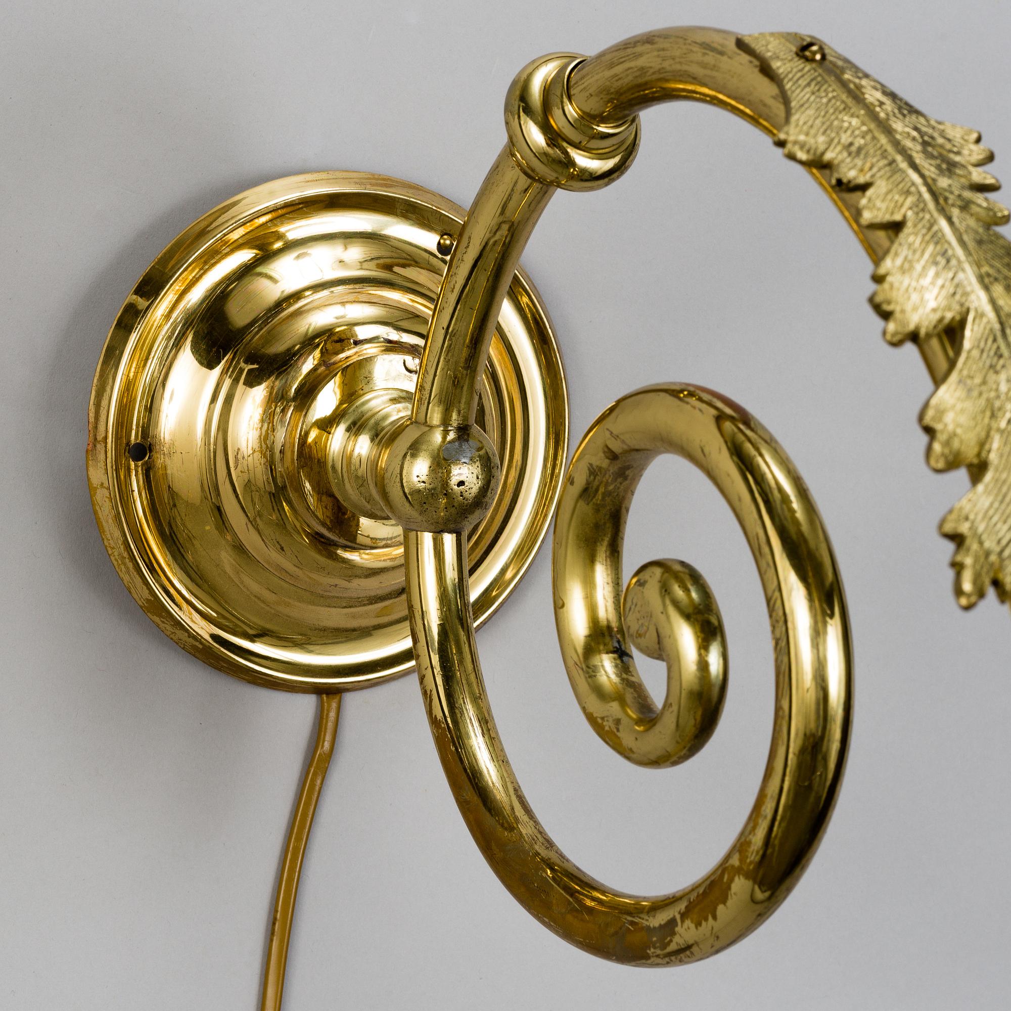Three mid 20th century brass wallscones.