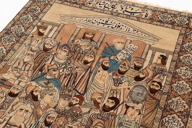 A Persian Kerman Laver 'Mashahir' (The rulers of the world) rug, c. 230 x 143 cm.