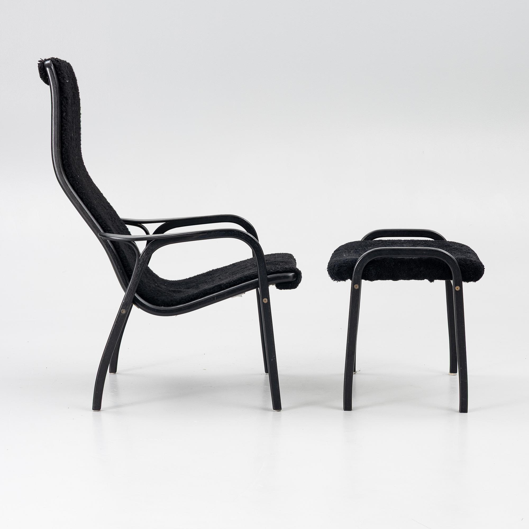 Yngve Ekström, a 'Lamino' easy chair with foot stool, Swedese 2010.