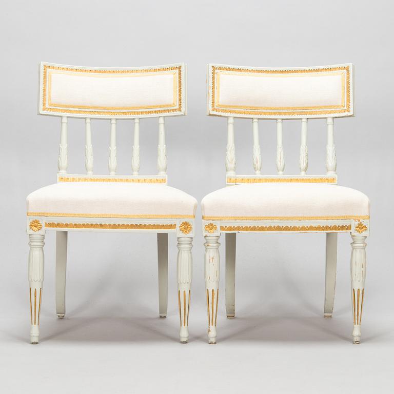 Four late Gustavian Stockholm chairs one signed EÖM  Erik Öhrmark turn of 18th/19th Century.