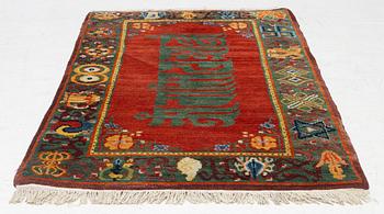A Nepalese rug, c. 157 x 91cm.