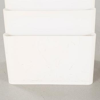 A pair of magazine racks, designed by Giotto Stoppino  for Kartell.