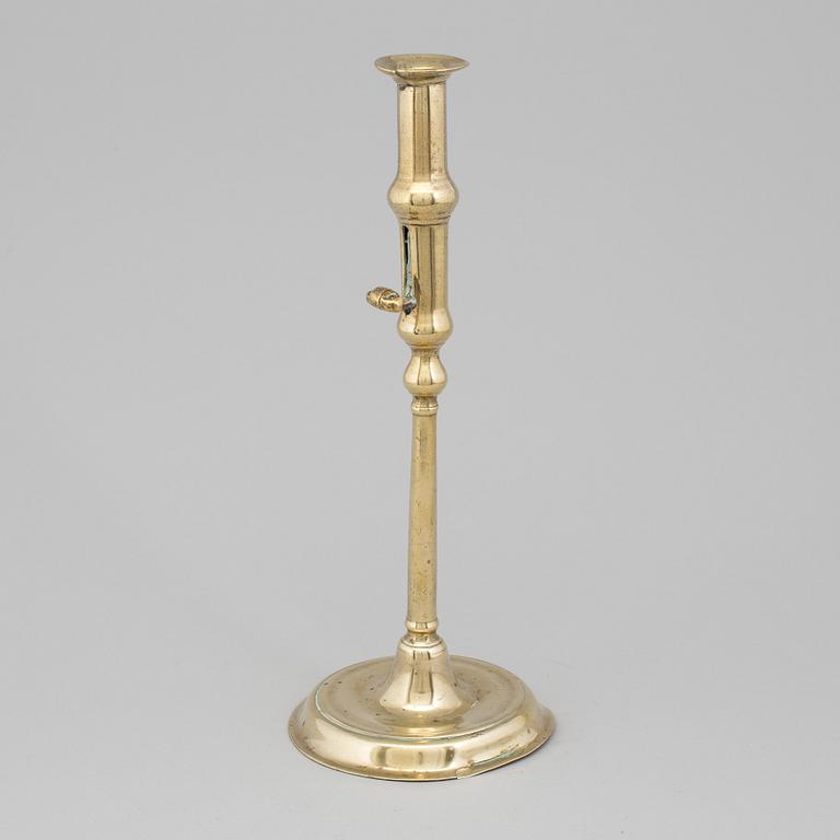 A BRONZE CANDLESTICK, England, 18th century.