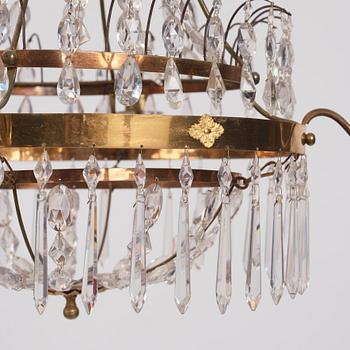 A late Gustavian four-light chandelier, early 19th century.