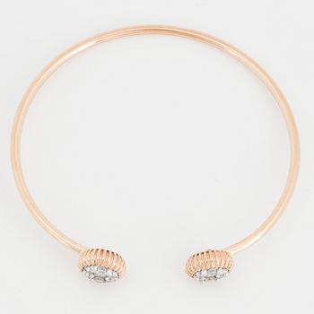 An 18K rose gold bracelet set with round brilliant-cut diamonds.