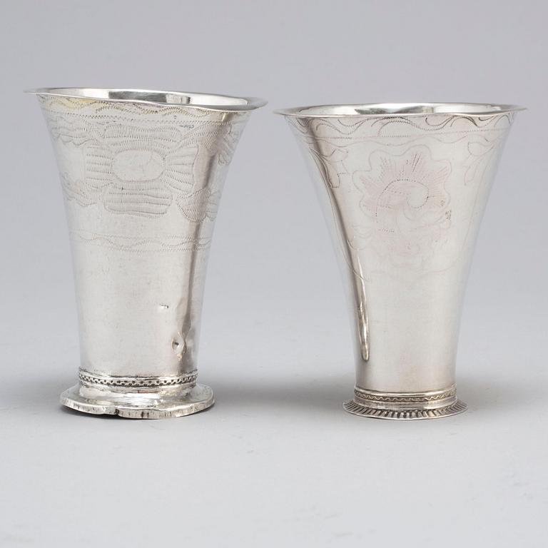 Two 18th Century silver beakers.