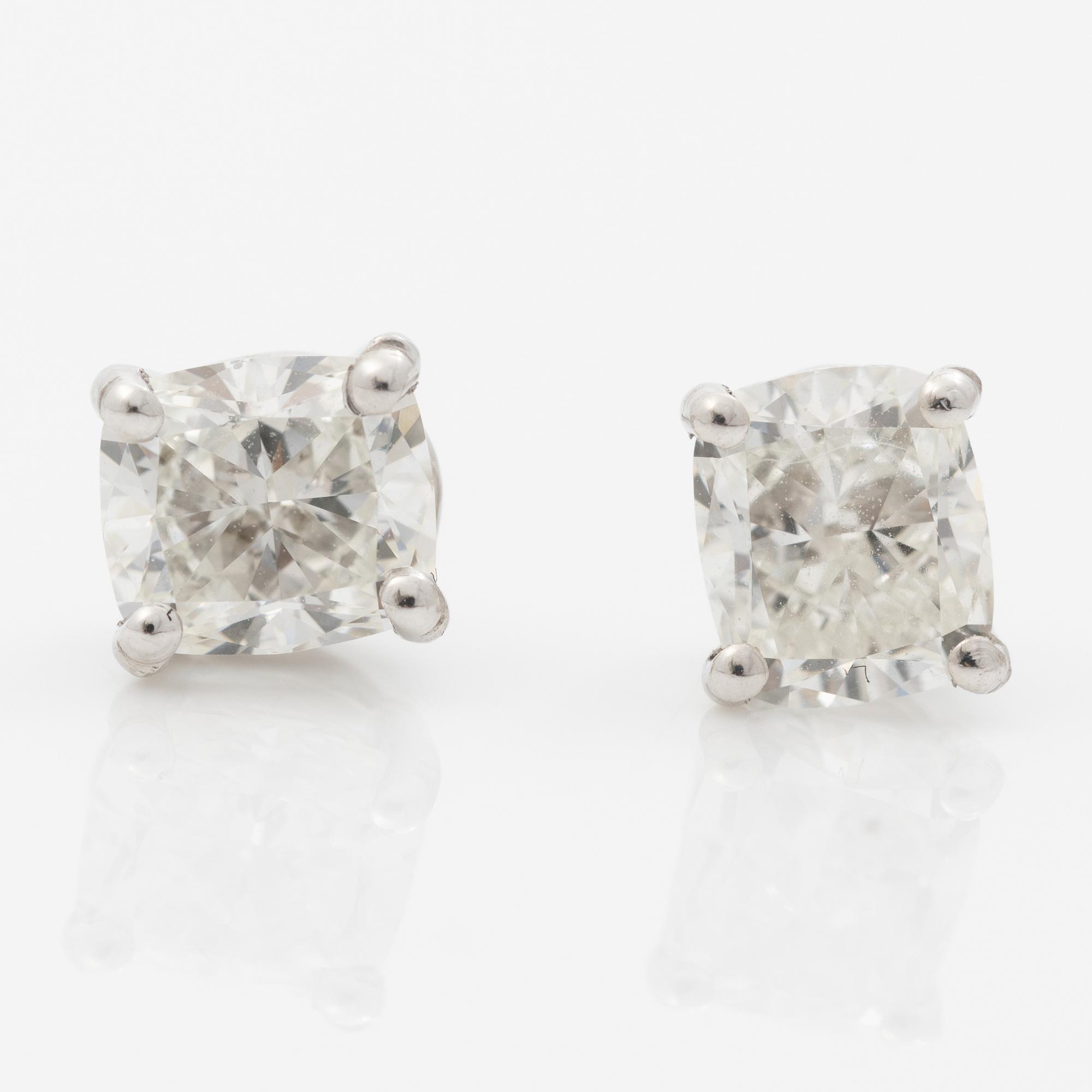 Earrings, a pair, 18K white gold with cushion-cut diamonds totalling 1.00 ct.