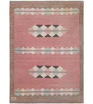 A flat weave carpet, signed GG, c. 190 x 133 cm.