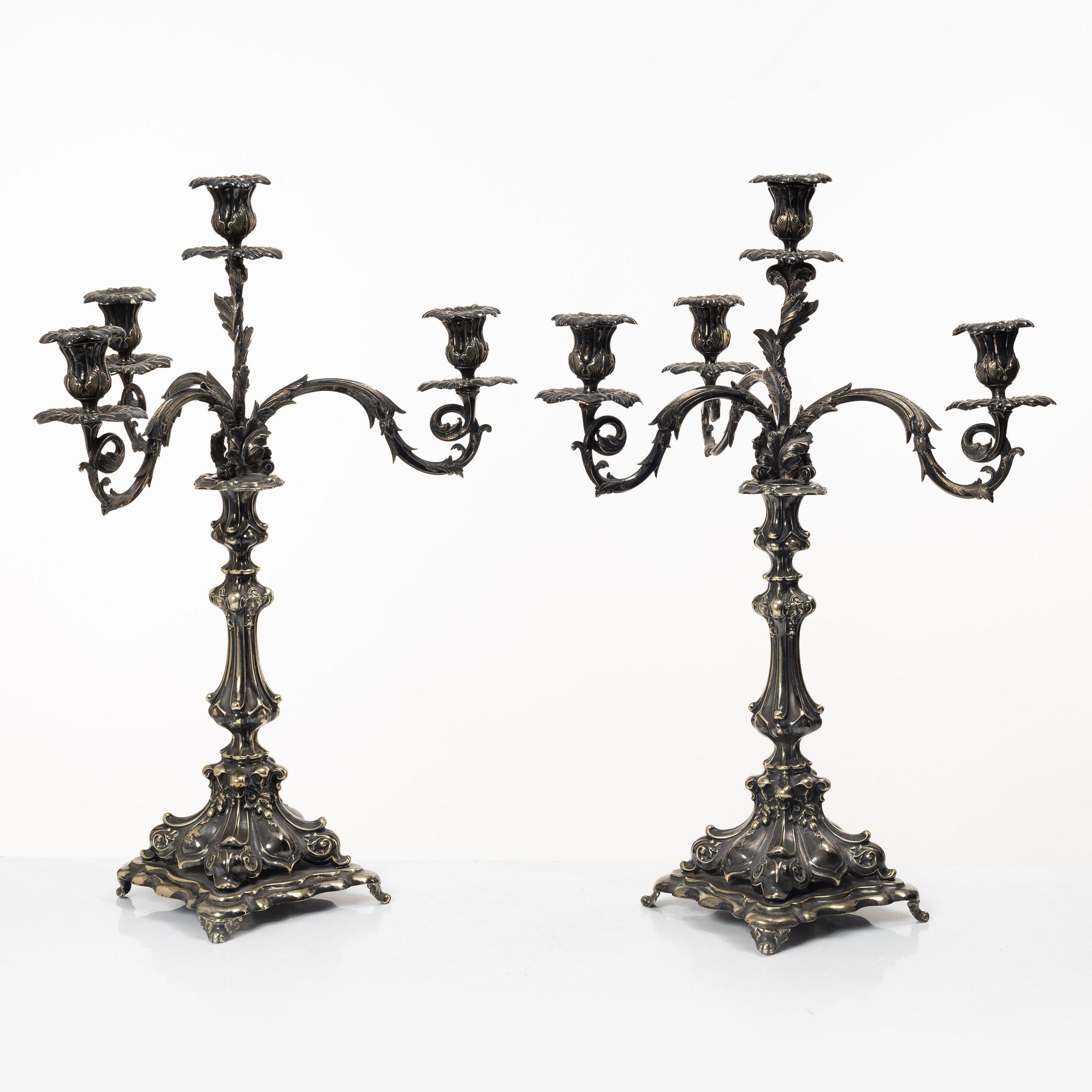 A pair of silver plated Rococo style candelabra, 20th century.