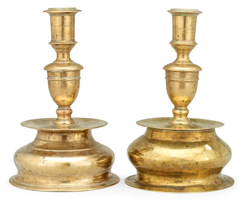 Two matched Baroque 17th century candlesticks.