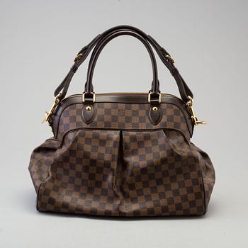 a LOUIS VUITTON 'Trevi GM' bag.